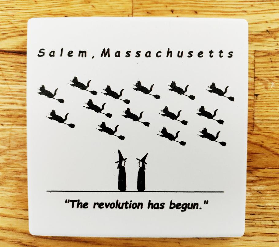 "The revolution has begun." White, ceramic, coaster with cork bottom.