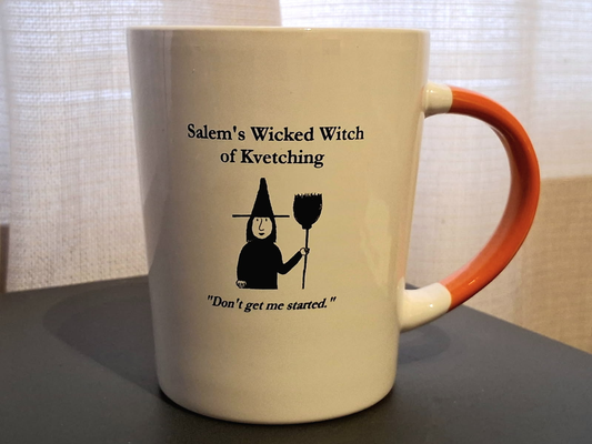 Salem's Wicked Witch of Kvetching "Don't get me started." White, ceramic, 13oz coffee mug with orange handle and interior.